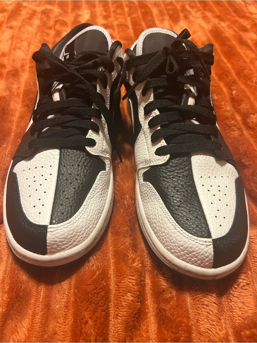 Women’s Black and White Low-Top Jordan 1 Sneakers